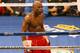 May 5, 2012; Las Vegas, NV, USA; Floyd Mayweather Jr. reacts after the end of the eighth round against Miguel Cotto at MGM Grand Garden Arena. Mandatory Credit: Jake Roth-USA TODAY Sports