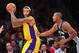 November 13, 2012; Los Angeles, CA, USA; Los Angeles Lakers center Jordan Hill (27) controls the ball against the San Antonio Spurs during the second half at Staples Center. Mandatory Credit: Gary A. Vasquez-USA TODAY Sports