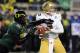 EUGENE, OR - DECEMBER 02 : Defensive end Dion Jordan #96 of the Oregon Ducks closes in on quarterback Kevin Prince #4 of the UCLA Bruins in the second quarter of the Pac-12 Championship game at Autzen Stadium on December 2, 2011 in Eugene, Oregon. (Photo by Steve Dykes/Getty Images)