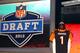 NEW YORK, NY - APRIL 26: Dre Kirkpatrick of Alabama holds up a jersey as he stands on stage after he was selected #17 overall by the Cincinnati Bengals in the first round of during the 2012 NFL Draft at Radio City Music Hall on April 26, 2012 in New York City. (Photo by Al Bello/Getty Images)
