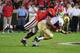 ATHENS, GA - SEPTEMBER 22: Jordan Rodgers #11 of the Vanderbilt Commodores is sacked on a 4th down play by Jarvis Jones #29 of the Georgia Bulldogs at Sanford Stadium on September 22, 2012 in Athens, Georgia. (Photo by Scott Cunningham/Getty Images)