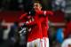 NEWCASTLE, ENGLAND - APRIL 11: Jardel (R) of Benfica celebrates with team mate Ezequiel Garay after the UEFA Europa League quarter final second leg match between Newcastle United and SL Benfica at St James' Park on April 11, 2013 in Newcastle upon Tyne, England. (Photo by Paul Thomas/Getty Images)