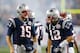 FOXBORO, MA - DECEMBER 10: Tom Brady #12 of the New England Patriots reacts with Ryan Mallett #15 against the Houston Texans at Gillette Stadium on December 10, 2012 in Foxboro, Massachusetts. (Photo by Jim Rogash/Getty Images)