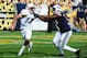 ATLANTA, GA - OCTOBER 27: Tevin Washington #13 of the Georgia Tech Yellow Jackets pressured by Ezekiel Ansah #47 of the BYU Cougars at Bobby Dodd Stadium on October 27, 2012 in Atlanta, Georgia. (Photo by Scott Cunningham/Getty Images)
