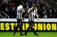 NEWCASTLE UPON TYNE, ENGLAND - MARCH 14: Newcastle player Cheick Tiote (l) consoles captain Yohan Cabaye after he was forced off due to injury during the UEFA Europa League Round of 16 second leg match between Newcastle United FC and FC Anji Makhachkala at St James' Park on March 14, 2013 in Newcastle upon Tyne, England. (Photo by Stu Forster/Getty Images)