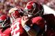 TUSCALOOSA, AL - NOVEMBER 17: AJ McCarron #10 of the Alabama Crimson Tide celebrates with Christion Jones #22 after Jones' touchdown against the Western Carolina Catamounts at Bryant-Denny Stadium on November 17, 2012 in Tuscaloosa, Alabama. (Photo by Kevin C. Cox/Getty Images)