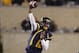 MORGANTOWN, WV - OCTOBER 20: Geno Smith #12 of the West Virginia Mountaineers drops back to pass against the Kansas State Wildcats during the game on October 20, 2012 at Mountaineer Field in Morgantown, West Virginia. (Photo by Justin K. Aller/Getty Images)