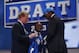 Apr 25, 2013; New York, NY, USA; Ezekiel Ansah (BYU) is introduced by NFL commissioner Roger Goodell (left) and former Detroit Lions player Barry Sanders as the number five overall pick to the Detroit Lions during the 2013 NFL Draft at Radio City Music Hall. Mandatory Credit: Jerry Lai-USA TODAY Sports