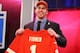 NEW YORK, NY - APRIL 25: Eric Fisher of Central Michigan Chippewas holds up a jersey on stage after he was picked #1 overall by the Kansas City Chiefs in the first round of the 2013 NFL Draft at Radio City Music Hall on April 25, 2013 in New York City. (Photo by Al Bello/Getty Images)