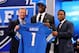 NEW YORK, NY - APRIL 25: Ezekiel Ansah of the BYU Cougars stands with NFL Commissioner Roger Goodell (L) and Pro Football Hall of Famer Barry Sanders (R) as they hold up a jersey on stage after Ansah was picked #5 overall by the Detroit Lions in the first round of the 2013 NFL Draft at Radio City Music Hall on April 25, 2013 in New York City. (Photo by Al Bello/Getty Images)