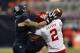 HOUSTON, TX - SEPTEMBER 29: D.J. Hayden #2 of the Houston Cougars is called for pass interference on Sam McGuffie #2 of the Rice Owls at Reliant Stadium on September 29, 2012 in Houston, Texas. (Photo by Bob Levey/Getty Images)
