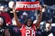 CINCINNATI, OH - NOVEMBER 17: Rutgers Scarlet Knights fan celebrates in the closing seconds of the game against the Cincinnati Bearcats at Nippert Stadium on November 17, 2012 in Cincinnati, Ohio. Rutgers won 10-3. (Photo by Joe Robbins/Getty Images)