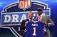 NEW YORK, NY - APRIL 25: E.J. Manuel of the Florida State Seminoles stands with NFL Commissioner Roger Goodell (L) as they hold up a jersey on stage after Manuel was picked #16 overall by the Buffalo Bills in the first round of the 2013 NFL Draft at Radio City Music Hall on April 25, 2013 in New York City. (Photo by Al Bello/Getty Images)