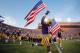 BATON ROUGE, LA - SEPTEMBER 15: Eric Reid #1 of the LSU Tigers carries an American Flag onto the field before playing the Idaho Vandals at Tiger Stadium on September 15, 2012 in Baton Rouge, Louisiana. (Photo by Chris Graythen/Getty Images)