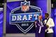 NEW YORK, NY - APRIL 25: Cordarelle Patterson (L) of the Tennessee Volunteers stands with NFL Commissioner Roger Goodell as they hold up a jersey after Patterson was selected #29 overall by the Minnesota Vikings in the first round of the 2013 NFL Draft at Radio City Music Hall on April 25, 2013 in New York City. (Photo by Al Bello/Getty Images)