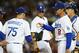 GLENDALE, AZ - MARCH 15: Manager Don Mattingly #8 of the Los Angeles Dodgers gives the ball to Paco Rodriguez #75 during a pitching change against the Kansas City Royals on March 15, 2013 in Glendale, Arizona. (Photo by Norm Hall/Getty Images)