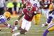 Nov 23, 2012; Fayetteville, AR, USA; Arkansas Razorbacks running back Knile Davis (7) rushes past LSU Tigers corner back Jalen Mills (28) at Donald W. Reynolds Razorback Stadium. LSU defeated Arkansas 20-13. Mandatory Credit: Nelson Chenault-USA TODAY Sports
