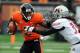 CORVALLIS, OR - DECEMBER 01: Wide receiver Markus Wheaton #2 of the Oregon State Beavers applies a stiff arm to defensive back Darvin Butler #39 of the Nicholls State Colonels in the second quarter of the game on December 1, 2012 at Reser Stadium in Corvallis, Oregon. (Photo by Steve Dykes/Getty Images)