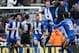 Callum Mcmanaman celebrates after giving Wigan the lead in the 49th minute.