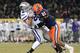 NEW YORK, NY - DECEMBER 30: Travis Tannahill #80 of the Kansas State Wildcats is tackled by Thomas Shamarko #21 of the Syracuse Orange during the New Era Pinstripe Bowl at Yankee Stadium on December 30, 2010 in New York, New York. (Photo by Chris McGrath/Getty Images)