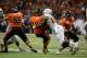 Dec 29, 2012; San Antonio, TX, USA; Texas Longhorns defensive end Alex Okafor (80) sacks Oregon State Beavers quarterback Cody Vaz (14) during the second half of the Alamo Bowl at the Alamodome. Texas beat Oregon State 31-27. Mandatory Credit: Brendan Maloney-USA TODAY Sports
