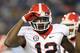 LEXINGTON, KY - OCTOBER 20: Tavarres King #12 of the Georgia Bulldogs celebrates after catching a touchdown pass during the game against the Kentucky Wildcats at Commonwealth Stadium on October 20, 2012 in Lexington, Kentucky. (Photo by Andy Lyons/Getty Images)