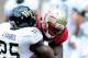 TALLAHASSEE, FL - SEPTEMBER 15: Joshua Harris #25 of the Wake Forest Demon Deacons is brought down by Vince Williams #11 of the Florida State Seminoles during a game at Doak Campbell Stadium on September 15, 2012 in Tallahassee, Florida. (Photo by Stacy Revere/Getty Images)