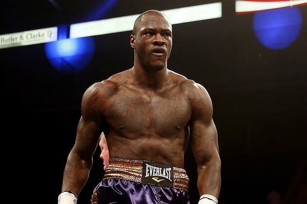 Unbeaten Wilder Stops Harrison in 1st Round