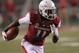 Sep 22, 2012; Fayetteville, AR, USA; Arkansas Razorbacks wide receiver Cobi Hamilton (11) runs after a catch against the Rutgers Scarlet Knights at Donald W. Reynolds Razorback Stadium. Rutgers defeated Arkansas 35-26. Mandatory Credit: Nelson Chenault-USA TODAY Sports