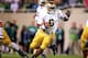 September 15, 2012; East Lansing, MI, USA; Notre Dame Fighting Irish running back Theo Riddick (6) finds a seam in the Michigan State Spartans defense during the 2nd half at Spartan Stadium. Norte Dame won 20-3 Mandatory Credit: Mike Carter-USA TODAY Sports