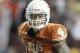 Oct 6, 2012; Austin, TX, USA; Texas Longhorns safety Kenny Vaccaro (4) looks into the back field during the game against the West Virginia Mountaineers at Darrell K Royal-Texas Memorial Stadium. West Virginia beat Texas 48-45. Mandatory Credit: Tim Heitman-USA TODAY Sports