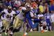 November 26, 2011; Gainesville FL, USA; Florida State Seminoles defensive tackle Everett Dawkins (93) sacks Florida Gators quarterback Jacoby Brissett (17) during the second half at Ben Hill Griffin Stadium. Florida State Seminoles defeated the Florida Gators 21-7. Mandatory Credit: Kim Klement-USA TODAY Sports