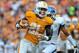 Oct 1, 2011; Knoxville,TN, USA; Tennessee Volunteers wide receiver Da'Rick Rogers (21) catches a pass to rush for a touchdown against the Buffalo Bulls during the first half at Neyland Stadium. Mandatory Credit: Jim Brown-USA TODAY Sports