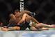 Apr 27, 2013; Newark, NJ, USA; Rustam Khabilov (green shorts) competes against Yancy Medeiros (black shorts) during UFC 159 at the Prudential Center. Mandatory Credit: Brad Penner-USA TODAY Sports
