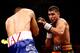 SHEFFIELD, ENGLAND - APRIL 27: Amir Khan in action against Julio Diaz at Motorpoint Arena on April 27, 2013 in Sheffield, England. (Photo by Scott Heavey/Getty Images)