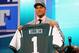 NEW YORK, NY - APRIL 25: Dee Milliner of the Alabama Crimson holds up a jersey on stage after Milliner was picked #9 overall by the New York Jets in the first round of the 2013 NFL Draft at Radio City Music Hall on April 25, 2013 in New York City. (Photo by Al Bello/Getty Images)