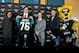 April 26, 2013; Jacksonville, FL, USA; Jacksonville Jaguars owner Shad Khan (left) , offensive lineman Luke Joeckel (second from left) , general manager Dave Caldwell (second from right) and head coach Gus Bradley pose for a picture after a press conference held at Everbank Field. Mandatory Credit: Rob Foldy-USA TODAY Sports