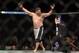 Apr 27, 2013; Newark, NJ, USA; Roy Nelson (white shorts) celebrates defeating Cheick Kongo (yellow and grey shorts) during UFC 159 at the Prudential Center. Mandatory Credit: Brad Penner-USA TODAY Sports