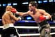 Apr 27, 2013; Brooklyn, NY, USA; Danny Garcia (green trunks) and Zab Judah (black trunks) trade punches during their WBA, WBC, and Ring Magazine, junior welterweight title bout at the Barclays Center. Garcia won via unanimous decision. Mandatory Credit: Joe Camporeale-USA TODAY Sports