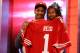 NEW YORK, NY - APRIL 25: Eric Reid of the LSU Tigers holds his daughter Eric Reid of the LSU Tigers as they hold up a jersey on stage after he was picked #18 overall by the San Francisco 49ers in the first round of the 2013 NFL Draft at Radio City Music Hall on April 25, 2013 in New York City. (Photo by Al Bello/Getty Images)