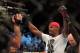 Apr 27, 2013; Newark, NJ, USA; Jon Jones (black shorts) celebrates defeating Chael Sonnen (white shorts) during UFC 159 at the Prudential Center. Mandatory Credit: Brad Penner-USA TODAY Sports