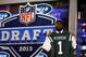 NEW YORK, NY - APRIL 25: Sheldon Richardson of the Missouri Tigers holds up a jersey on stage after he was picked #13 overall by the New York Jets in the first round of the 2013 NFL Draft at Radio City Music Hall on April 25, 2013 in New York City. (Photo by Al Bello/Getty Images)