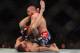 Apr 27, 2013; Newark, NJ, USA; Jim Miller (blue and red shorts) competes against Pat Healy (black shorts) during UFC 159 at the Prudential Center. Mandatory Credit: Brad Penner-USA TODAY Sports