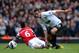 LONDON, ENGLAND - APRIL 28: Robin van Persie of Manchester United clashes with Laurent Koscielny of Arsenal during the Barclays Premier League match between Arsenal and Manchester United at Emirates Stadium on April 28, 2013 in London, England. (Photo by Shaun Botterill/Getty Images)