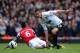 LONDON, ENGLAND - APRIL 28: Robin van Persie of Manchester United clashes with Laurent Koscielny of Arsenal during the Barclays Premier League match between Arsenal and Manchester United at Emirates Stadium on April 28, 2013 in London, England. (Photo by Shaun Botterill/Getty Images)