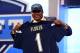 NEW YORK, NY - APRIL 25: D.J. Fluker of the Alabama Crimson Tide holds up a jersey on stage after he was picked #11 overall by the San Diego Chargers in the first round of the 2013 NFL Draft at Radio City Music Hall on April 25, 2013 in New York City. (Photo by Al Bello/Getty Images)