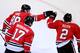 CHICAGO, IL - APRIL 26: Patrick Kane #88 of the Chicago Blackhawks celebrates his first period goal, his 23rd of the season, with teammates Duncan Keith #2 and Sheldon Brookbank #17 against the Calgary Flames at the United Center on April 26, 2013 in Chicago, Illinois. The Blackhawks defeated the Flames 3-1. (Photo by Jonathan Daniel/Getty Images)