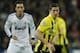 MADRID, SPAIN - NOVEMBER 06: Robert Lewandowski of Borussia Dortmund controls the ball backdropped by Mesut Ozil of Real Madrid during the UEFA Champions League group D match between Real Madrid and Borussia Dortmund at Estadio Santiago Bernabeu on November 6, 2012 in Madrid, Spain. (Photo by Jasper Juinen/Getty Images)