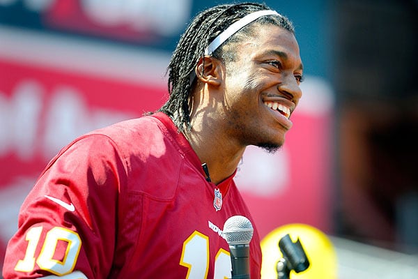 RG III Does Jumping Jacks for Team's Fans