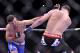 Jan 28, 2012; Chicago, IL, USA; UFC fighter Demian Maia (left) fights against Chris Weidman during UFC on Fox 2 at the United Center. Weidman defeats Maia. Mandatory Credit: Mike Dinovo-USA TODAY Sports